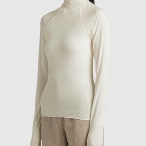 The line by k open back turtleneck